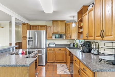 This kitchen offers updated appliances and everything you need to prepare meals with ease.