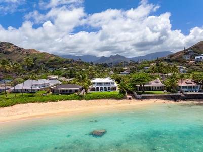 Aerial perspective showcasing Mokulua Sunrise Estate’s rare beachfront position along Lanikai’s golden sands.