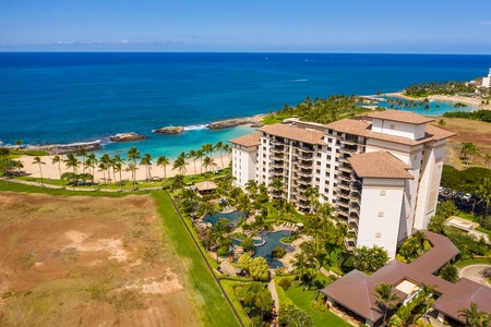 Stunning oceanfront resort property positioned on pristine beach with turquoise waters and expansive grounds.