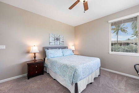 Upstairs Guest bedroom 1 has queen bed, AC and fan.