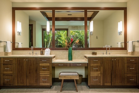 Capacious primary bath featuring dual vanities.