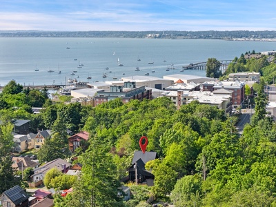 Look out over sailboats and waterfront strolls along the marina.