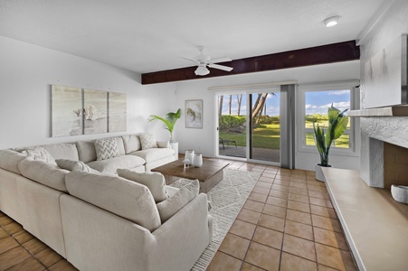 Bright and lively living room with sliding doors to your backyard paradise