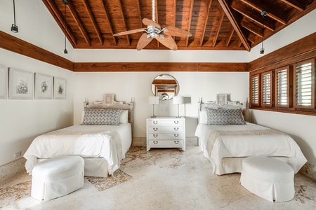 The fourth guest suite has two double beds, perfect for the kids.