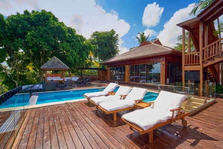 Enjoy a cool drink by the pool.