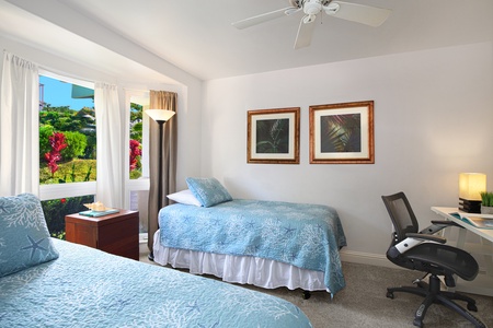 A third suite features twin beds and its own ensuite bathroom for added privacy.