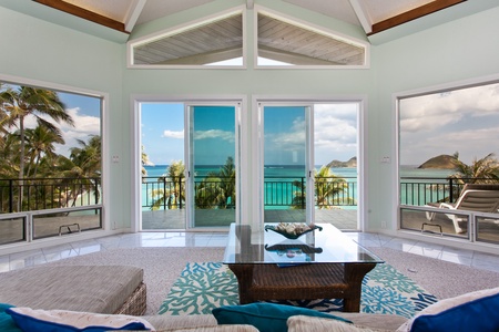 Oceanfront serenity meets modern comfort in this bright haven with unobstructed views.