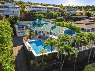 Honu Hale perched above the Kona coast with expansive pool deck views.