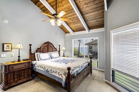 Primary bedroom equipped with A/C, TV, Ocean views, and ensuite