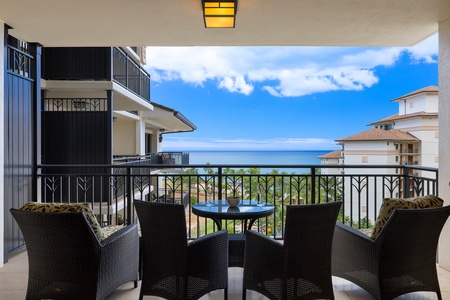 Lanai dining set with unobstructed lagoon and sky backdrop.