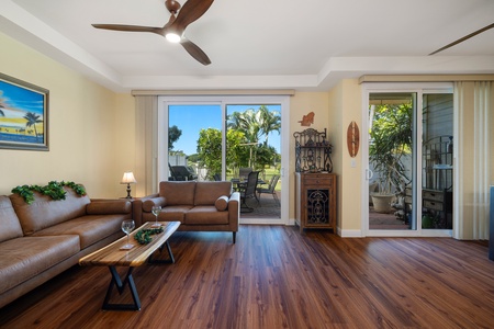 Unwind in the spacious living room with modern decor and warm tones.