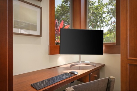 Office nook with built-in desk, external monitor, printer, and beautiful views.
