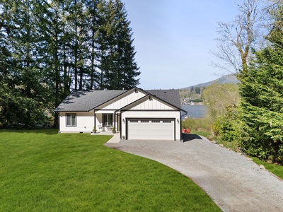 Pull into the spacious driveway with room for your crew, gear, and even a boat trailer for ultimate lake days.