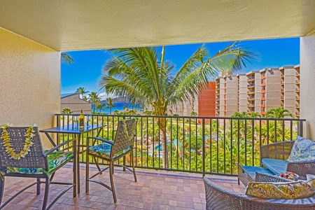 Savor wine on the lanai at Kaanapali Shores 544 with tropical views and ocean breezes.