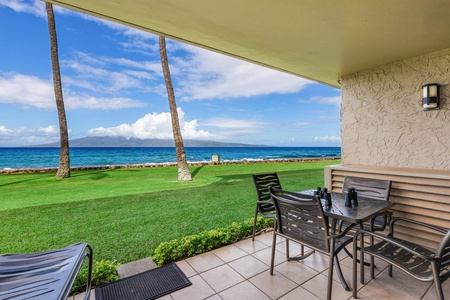Papakea L-106 offers spacious living room with ocean views, offering a relaxing ambiance and comfortable seating