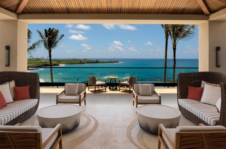 A grand, ocean-view lobby greets you upon arrival.