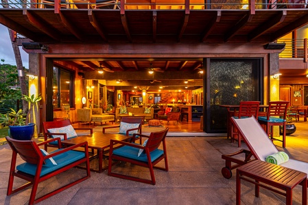 Open-air entertainment space with vibrant decor and ocean views.