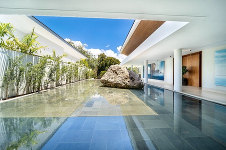 Beautifully tiled courtyard that harmonizes natural elements with contemporary design.