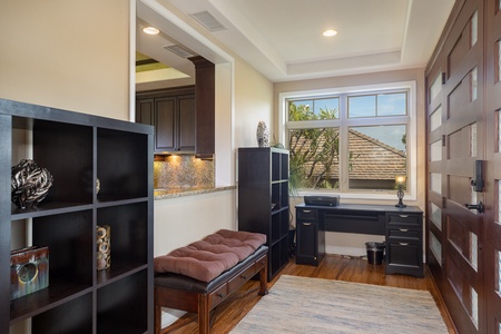 Convenient desk area just off the kitchen for remote work or trip planning.