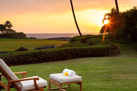 Stunning oceanfront golf course setting with perfect sunset views from this tropical paradise.