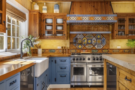 The kitchen features stainless steel appliances.