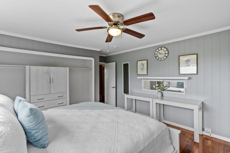Unpack and settle in with plenty of storage space in this well-appointed guest bedroom.