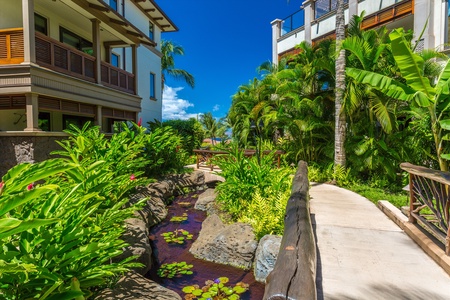 Beautiful Water Features Tropical Foliage and Evening Tiki Torches Throughout the WBV Property