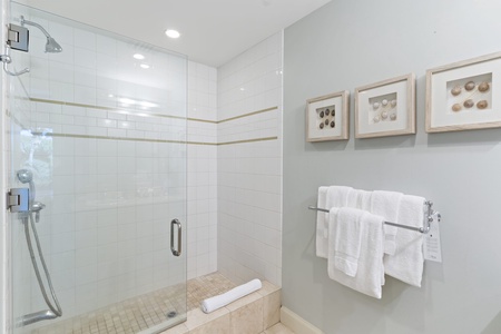 The ensuite bath at Wailea Hoolei 93-3 includes a separate walk-in shower for added luxury.