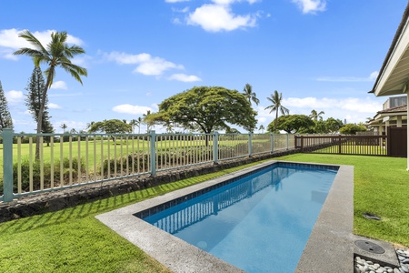 Private pool with lush green views.