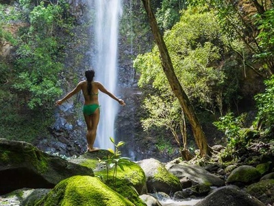A jungle waterfall within reach on an afternoon away from the beach.