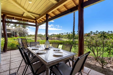 Gather and dine on the lanai with table for six.