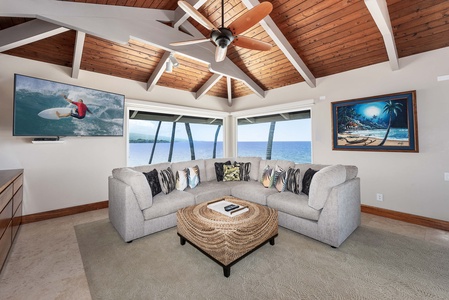 Lounge in the primary bedroom's lounge area with stunning ocean views.