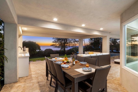 Relax on the chaise lounge with uninterrupted pool views and garden ambiance under the Hawaiian sky.