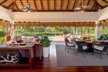 Lounge or dine in the cabana with seamless transition to the pool.