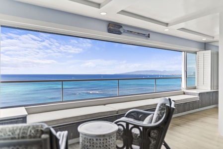 Unwind in your private oceanfront retreat with breathtaking sea views through open panoramic windows.