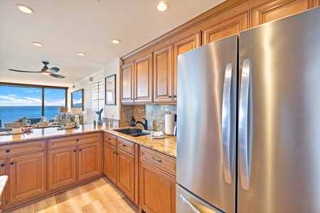 Mahana 1118 features a spacious kitchen with stainless appliances and ample counter space.