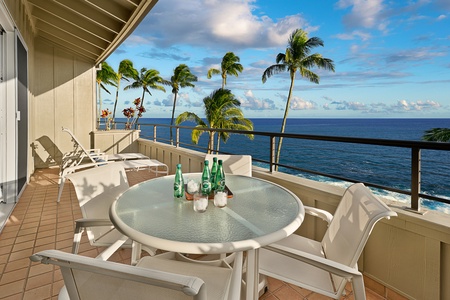 Enjoy alfresco dining on the covered lanai with seating for four and breathtaking ocean views.