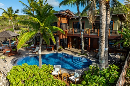 Exterior view of the estate perched on dramatic lava rock cliffs.