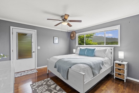 Step straight onto the deck from this bright guest room and take in the fresh island air.