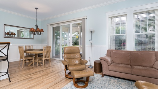 Seamless living in the beautifully furnished living room that overlooks the kitchen and dining room