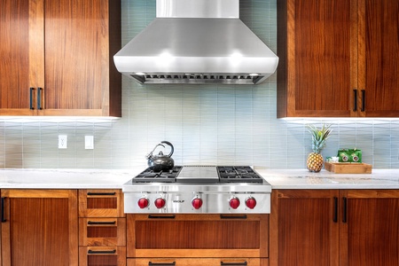 Wolf range and premium finishes invite gourmet meals and elevated evenings.