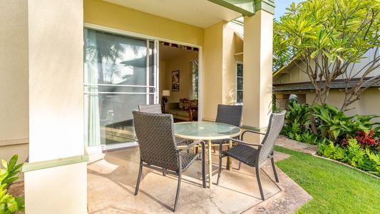 The tranquil back yard where you can dine al fresco under swaying palm trees.