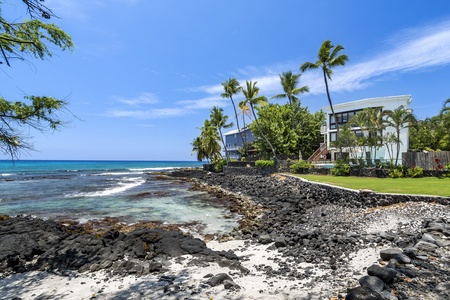 Sand strip leading into the beach in front of the property