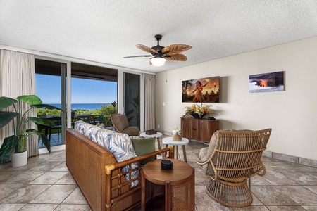 Sink into the sofa with the Pacific framed across the windows.