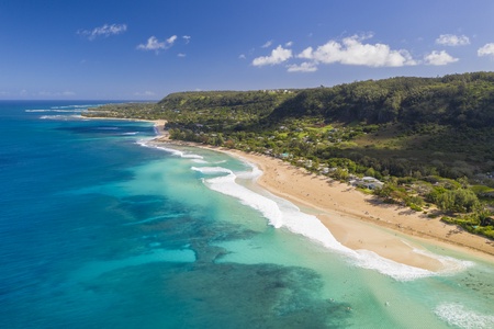 Aerial view of the coastline fronting the property.