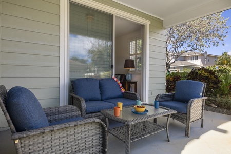 Enjoy morning coffee or evening relaxation on the private covered lanai surrounded by lush tropical greenery.