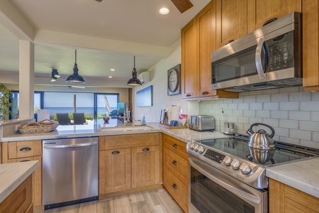 Cozy up in the indoor living space with seamless views of paradise.