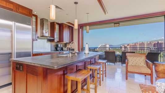 Enjoy casual bites at the breakfast bar while watching the island light dance over the coastline.