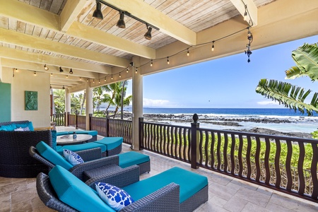 String lights and sectional seating frame a perfect sunset scene—ideal for evening relaxation