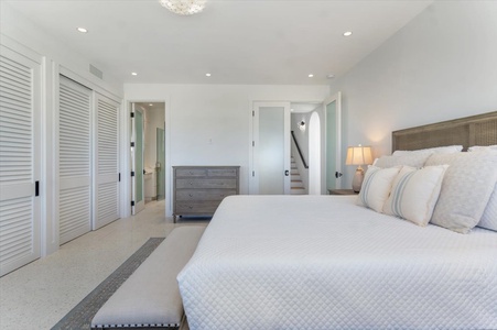 Spacious bedroom with king bed and direct ensuite access.